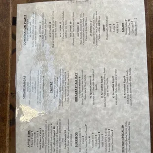 a menu on a wooden table