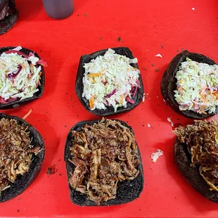a selection of pulled pork sandwiches