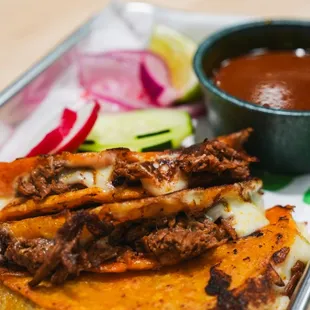 Our delicious red birria tacos!