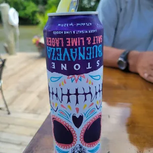  can of beer on a table