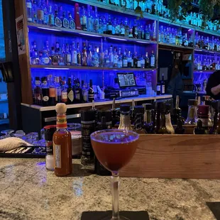 Shelby's banana bread chai tea w/ scotch and mezcal tequila. Start w/ her og drink that includes cognac and nixta. delicate and dangerous