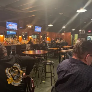 people sitting at the bar