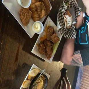 Mother cluckers, cod tacos, Rooster Wings, Hot Spinach Dip