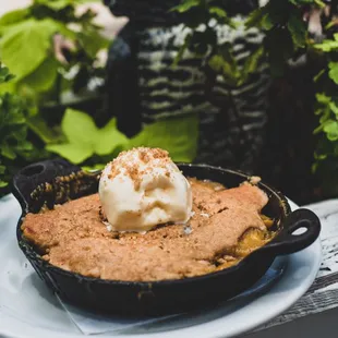 Piping hot peach cobbler a la mode