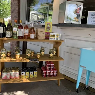 Our mini-market is still outside for the pandemic! Stop by for coffee, beverages, prepared foods, and staples like eggs and milk!