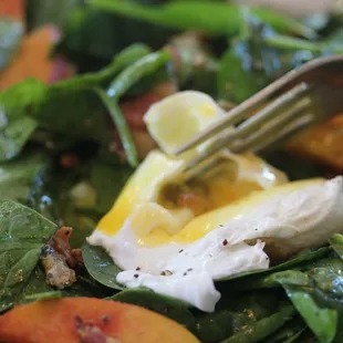 Warm Spinach Salad with Texas Peaches, Pecans, and  Soft Poached Egg
