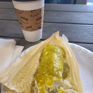 Chicken tamale and tall coffee.