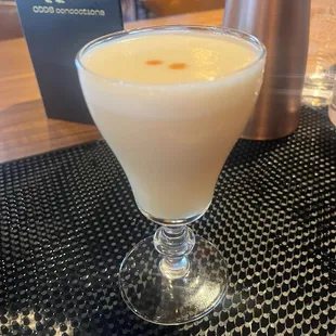 Snake eyes... fun cocktail with raspberry infused rye whiskey, lemon juice and egg white with an absinthe wash.
