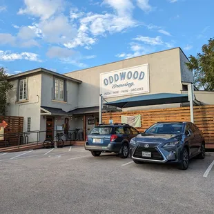 two cars parked in a parking lot