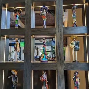 a display of mexican figurines