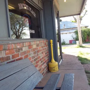 a bench outside of a restaurant