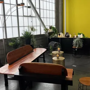 a living room with a yellow wall