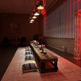 a long table in a dimly lit room
