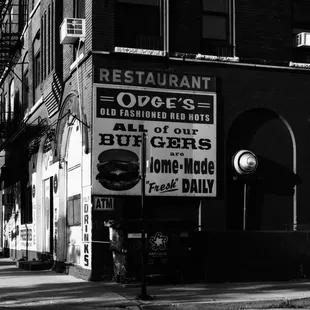 a black and white photo of a restaurant