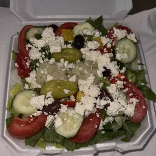 Greek Salad and potato salad are always a must have!
