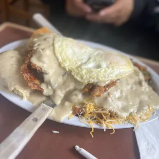 F.B.D $22.99 (it's the kitchen sink with a chicken fried steak with biscuit covered in gravy)