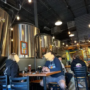 a man and woman sitting at a table