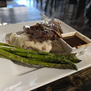 New York strip with Fungi* and Demi Glace