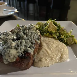 8 oz filet with grits, Sauteed Brussels Sprouts*, and blue cheese