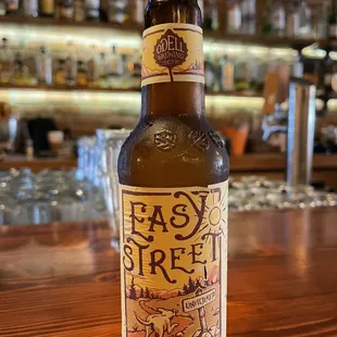 a bottle of beer on a bar