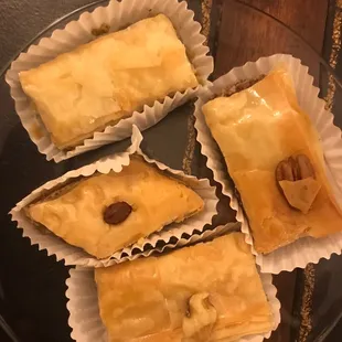 a variety of pastries on a glass plate