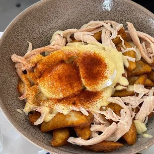 Delicious poached eggs with lovely hollandaise sauce and smoked chicken