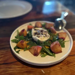 TENBRINK FARMS STONE FRUIT WITH DI STEFANO BURRATA, ARUGULA AND PISTACHIO VINAIGRETTE