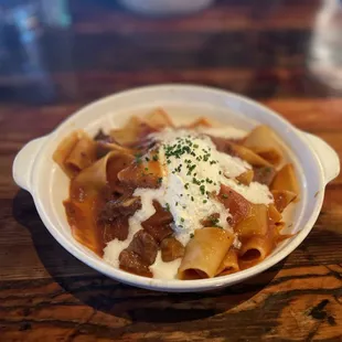 PAPPARDELLE WITH SHORT RIB SUGO, GARLIC, ONION, TOMATO AND HORSERADISH CREMA