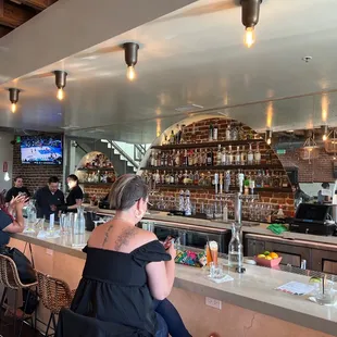 people sitting at the bar