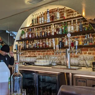 a bartender at the bar