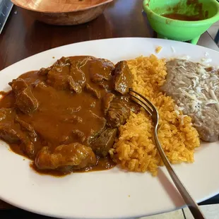 Chile Colorado, tender pieces of pork in a tasty red sauce.