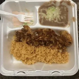 Sorry I ate the salad before I took the pick. Combo plate of camarones ala plancha with rice, beans&amp; cheese, tortillas, and small salad.