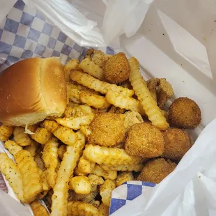 Filet of sole with fries and hush puppies