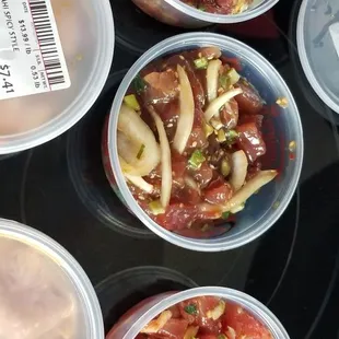 Poke taste testing "da Hawaiian" Off da Hook on top