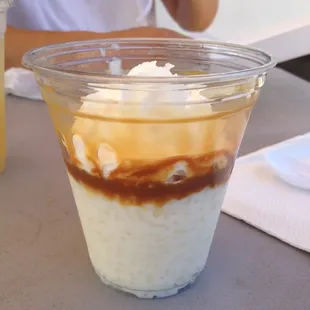 a dessert in a plastic cup
