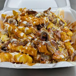 Tri-Tip Buffalo Fries. Extra Saucy &amp; Extra Cheesy.