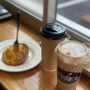 Egg croissant sandwich, iced chai tea, coffee