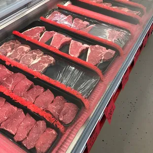 a display of raw meat