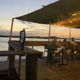 Outside patio dining on the water