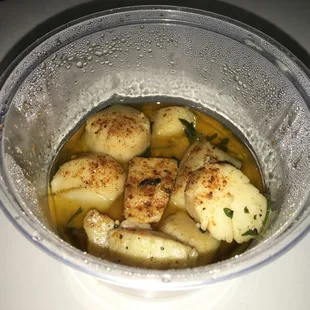 Sautéed Scallops ($11.99) 1/2 pound in butter garlic sauce.