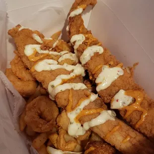 Catfish, shrimps, hush puppies, fries, calamari - all perfectly fried.