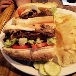 The famous, Fair Haven PO Boy sandwich. House smoked beef brisket in a Demi glaze.