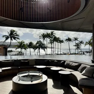 a circular seating area overlooking the ocean