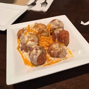 Sloppy balls- pretzel balls, covered with crab dip and cheese