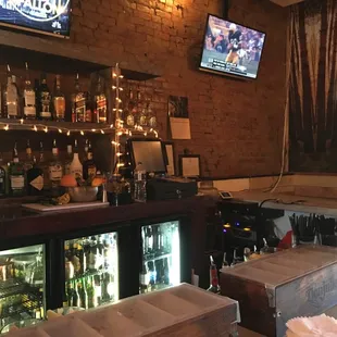 a bar with bottles of alcohol