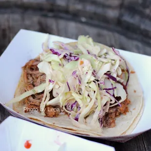 Pork taco on gluten free corn tortillas ($7)