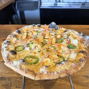 The Engineer - Buffalo chicken, red onion, jalapeños, Parmesan cheese across the crust