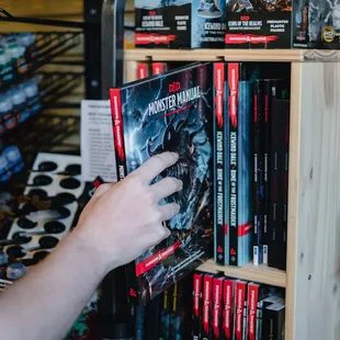 a man holding a dvd in a store