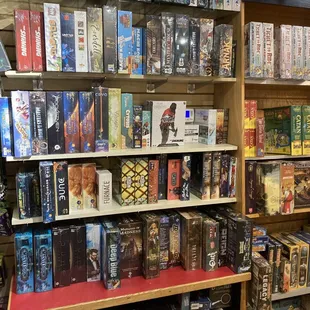 a shelf full of board games