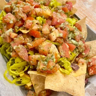 Close up of Beef Brisket Nachos. Soooooooo good. A meal in itself. Goes great with coooooold brewskies. Loook how goooood!